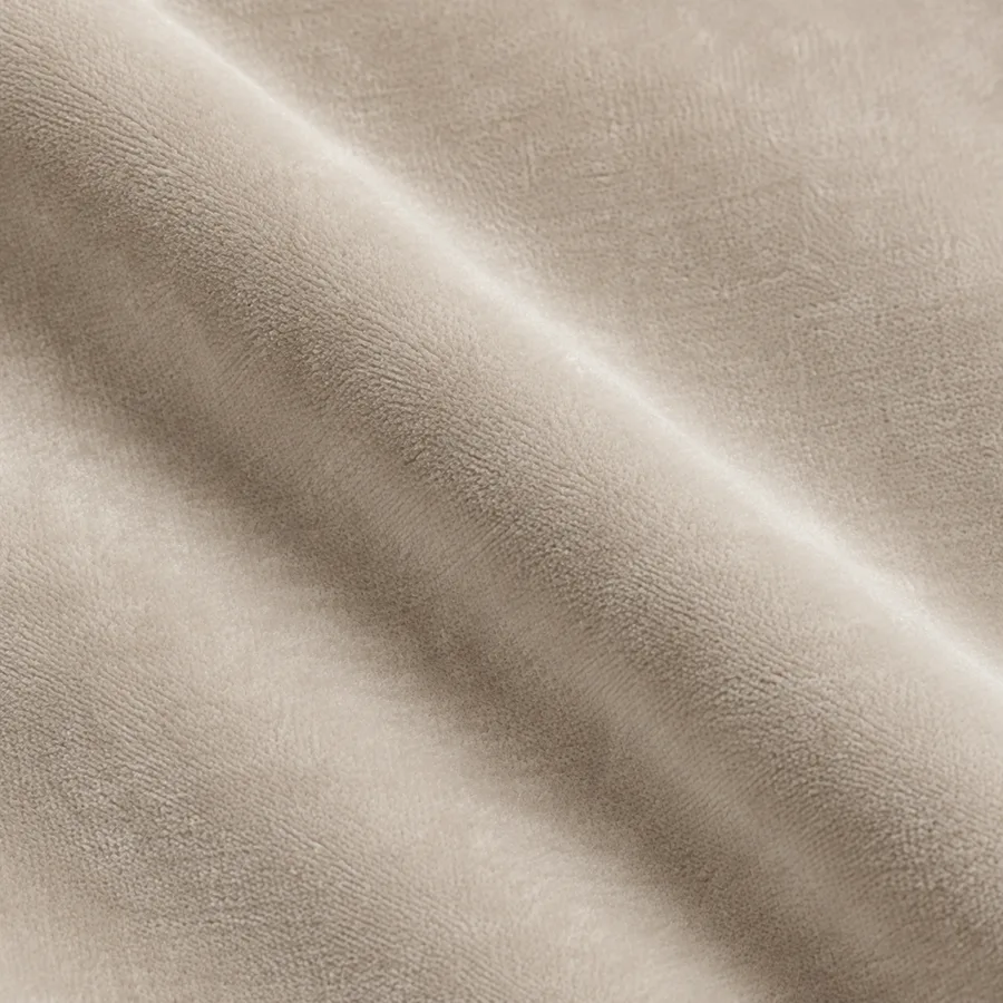 Close-up of pale oyster plain velvet pile