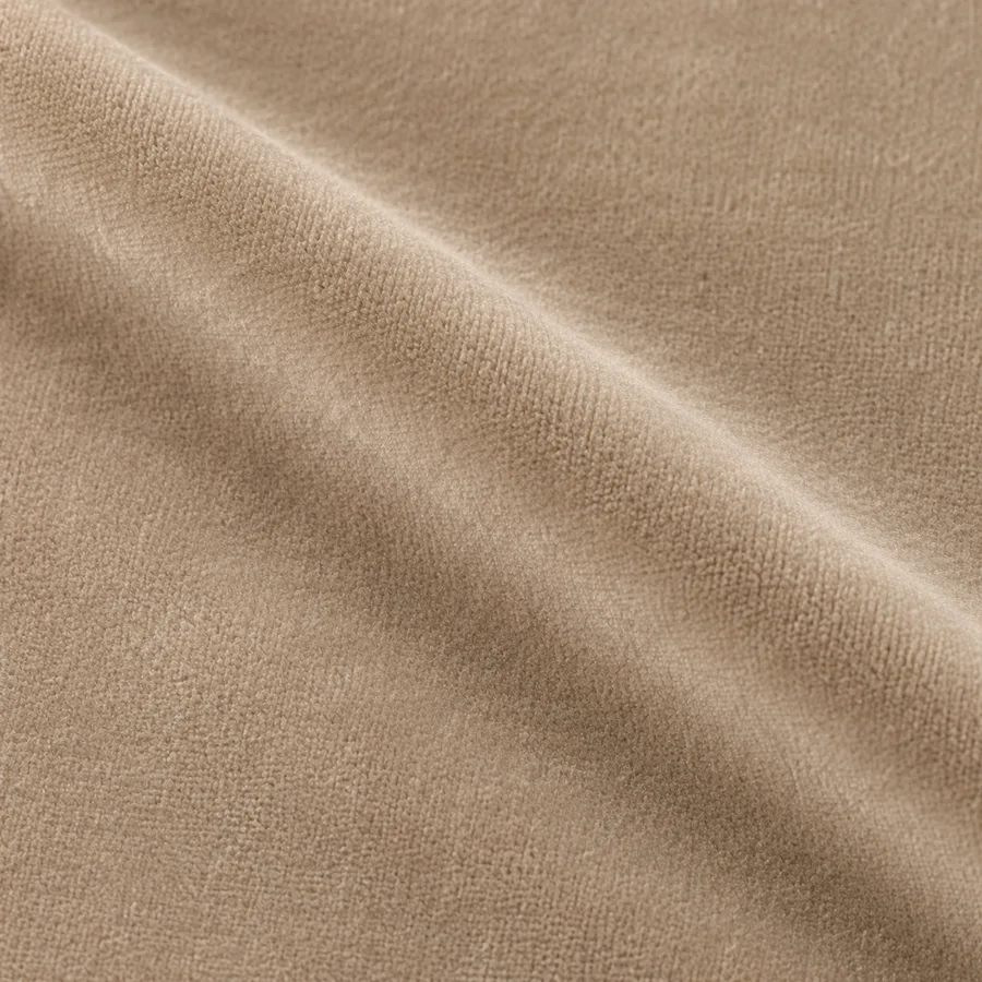 Close-up of warm beige plain velvet pile