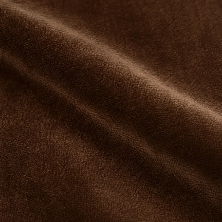 Close-up of rich cocoa plain velvet pile