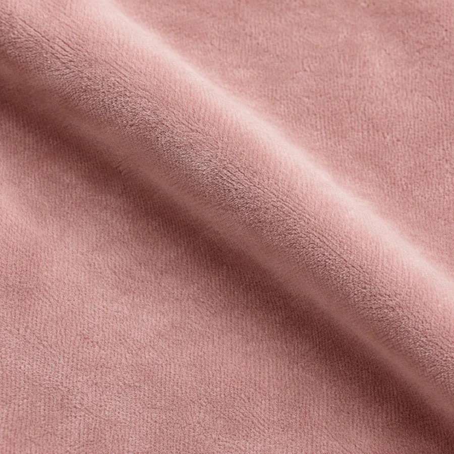 Close-up of soft blush plain velvet pile