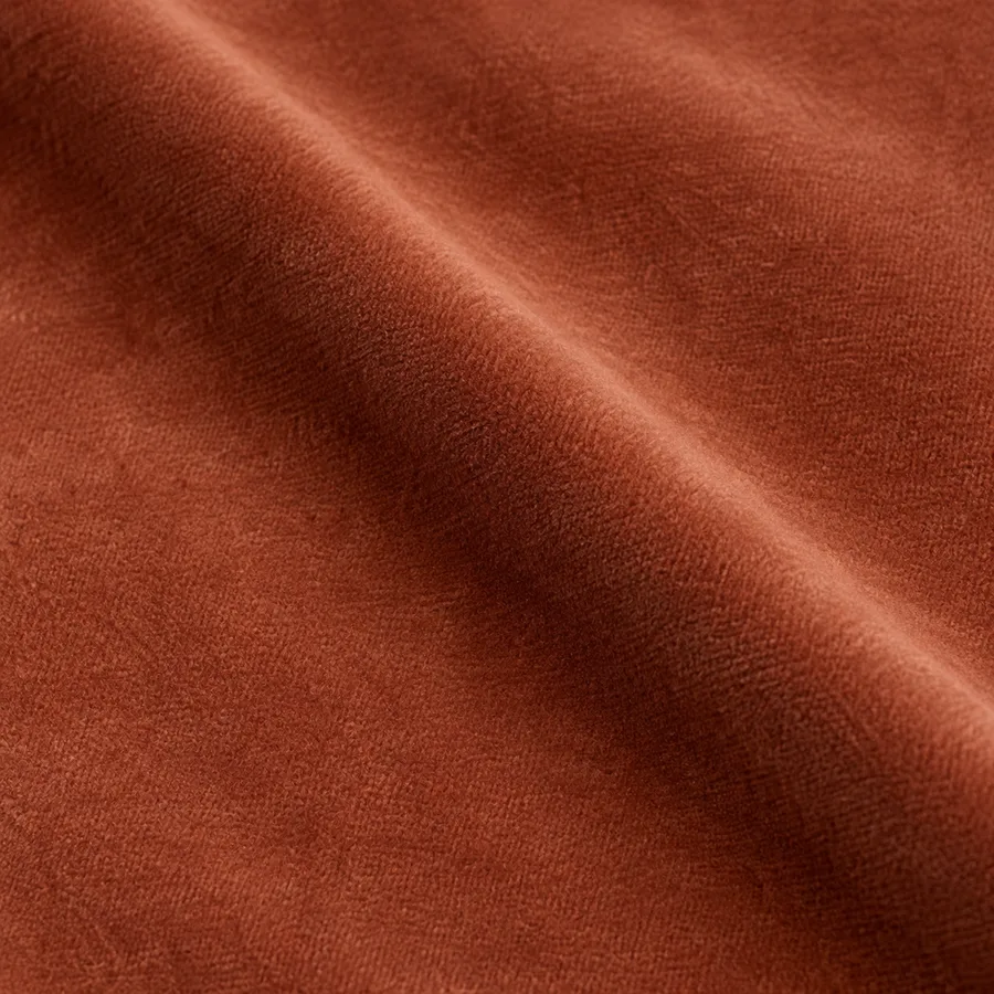 Close-up of terracotta plain velvet pile