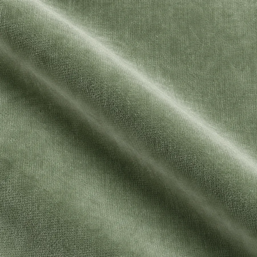 Close-up of pale sage plain velvet pile